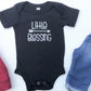 Black baby bodysuit with the text Little Blessing