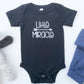 Black baby bodysuit with the text Little Miracle