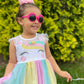 Toddler girl wearing pink flower toddler sunglasses