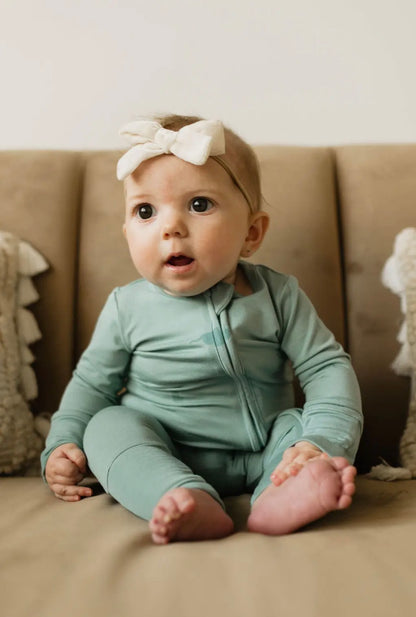 baby boy wearing agave baby bamboo pajamas romper